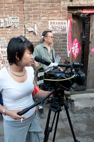 Lin Jing with Wu Yaubo recording autio in China